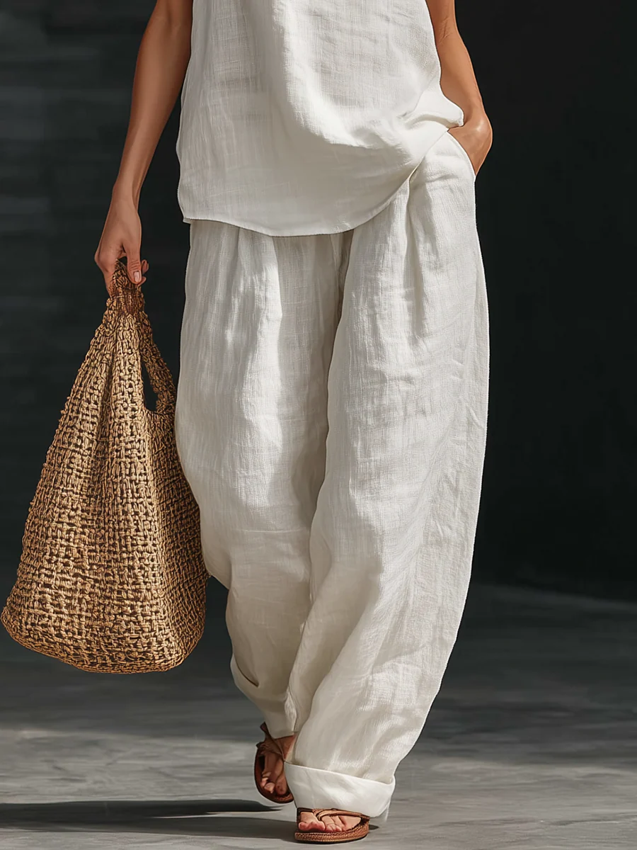 Carlotta – Completo elegante senza maniche con pantaloni a palazzo