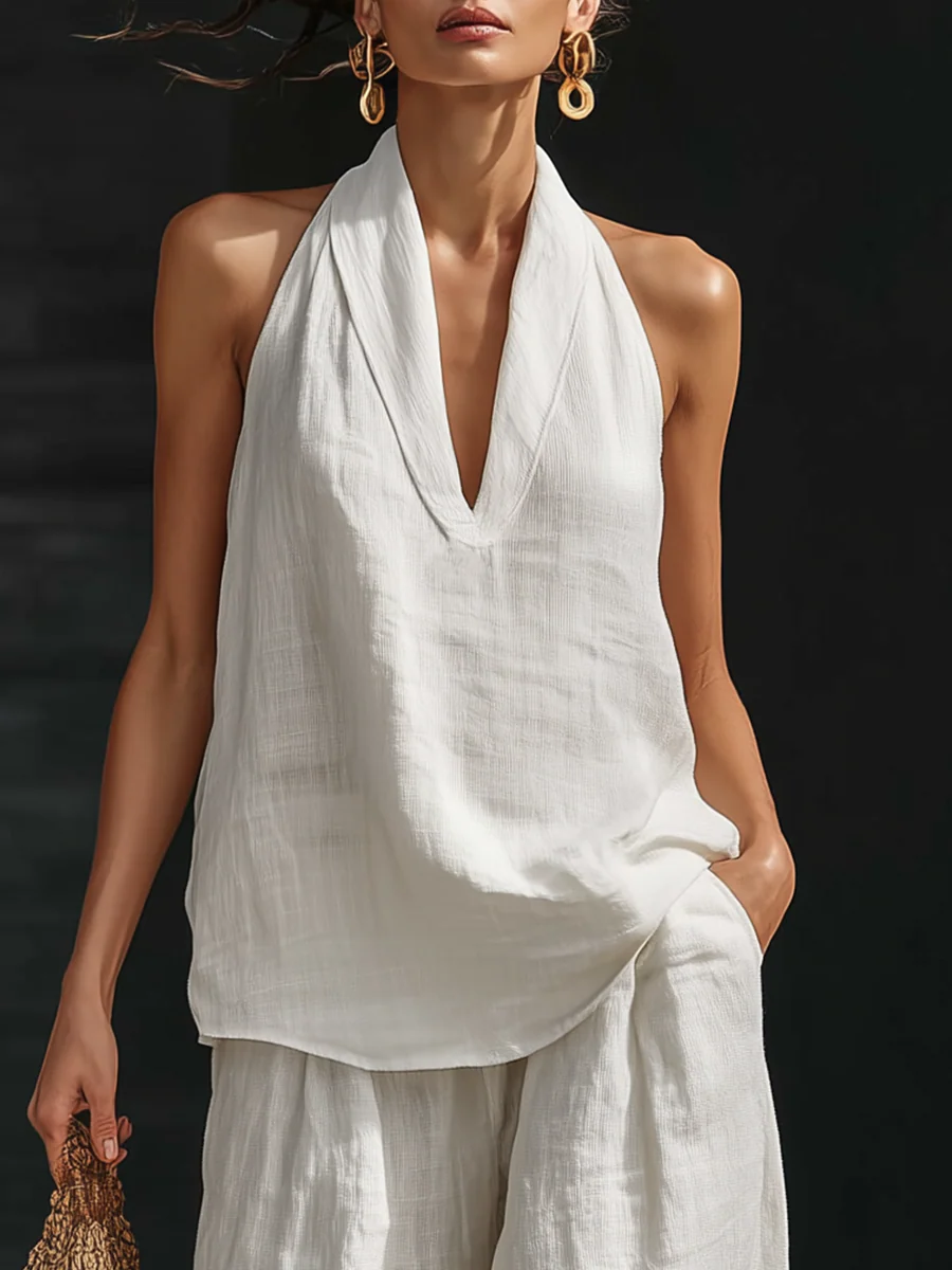 Carlotta – Completo elegante senza maniche con pantaloni a palazzo
